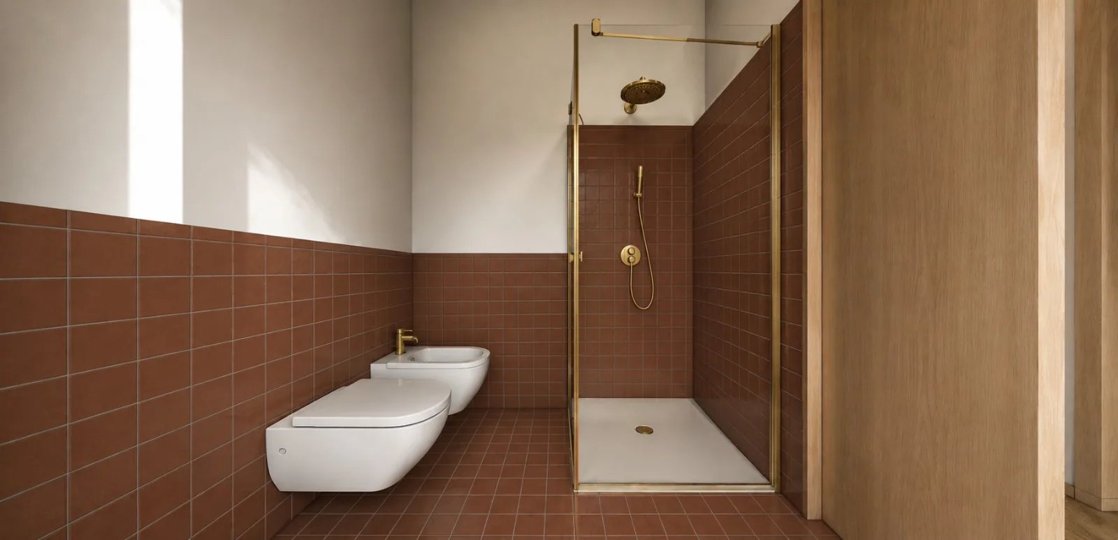 Doccia walk-in con rubinetteria in finitura ottone